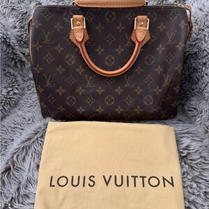 Louis Vuitton Speedy 30 Classic Monogram Satchel.